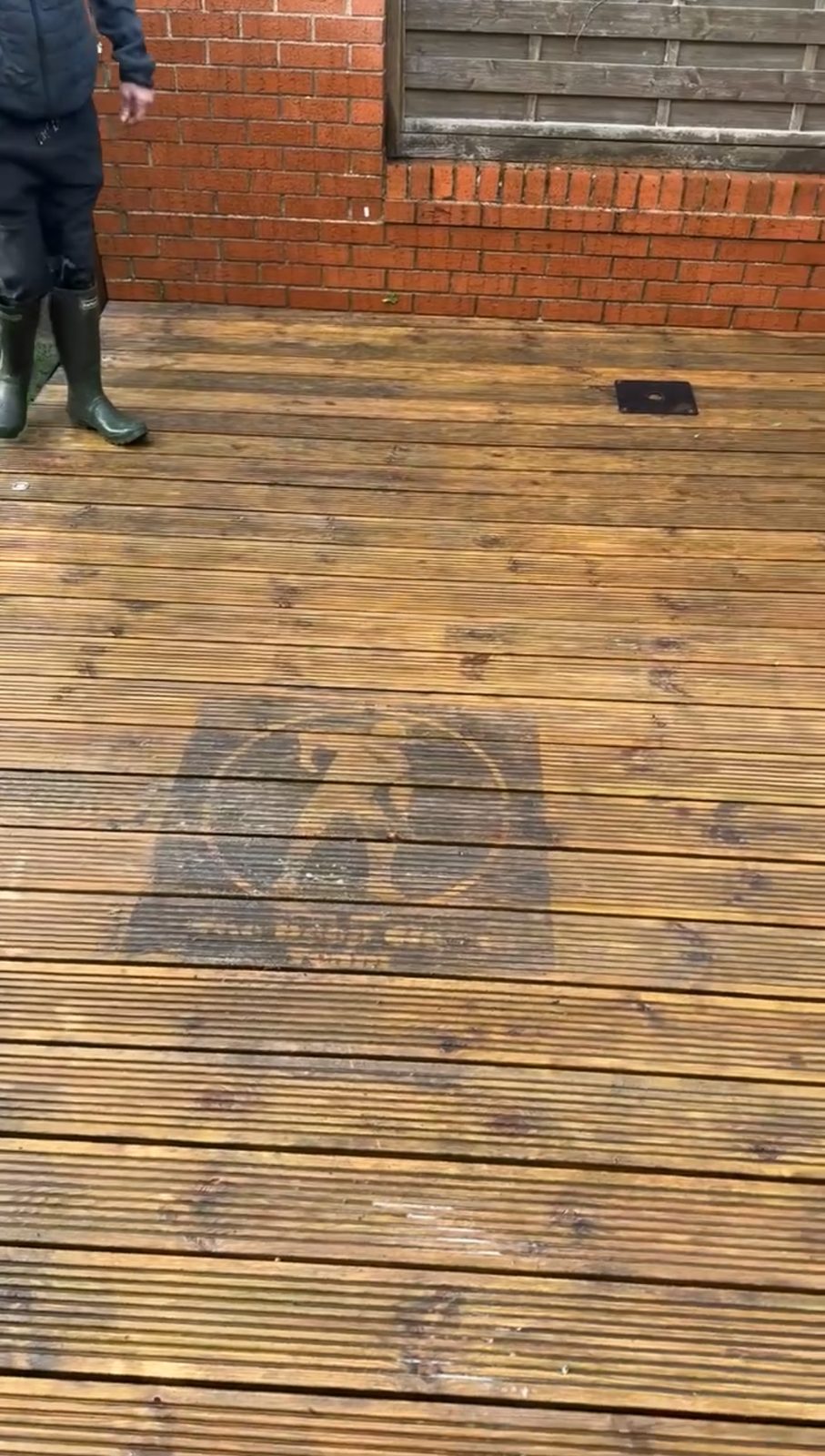 Decking cleaning in progress in Leeds